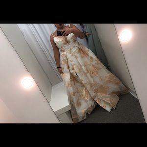 White a rose gold ball gown